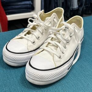 Converse Low Top Sneakers in White with Black Trim